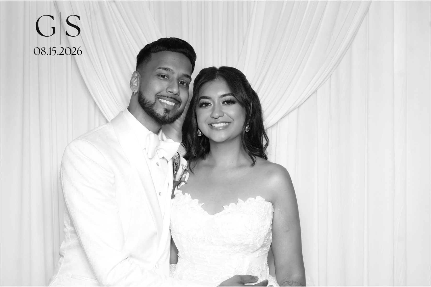 Wedding couple enjoying the Glam photo booth